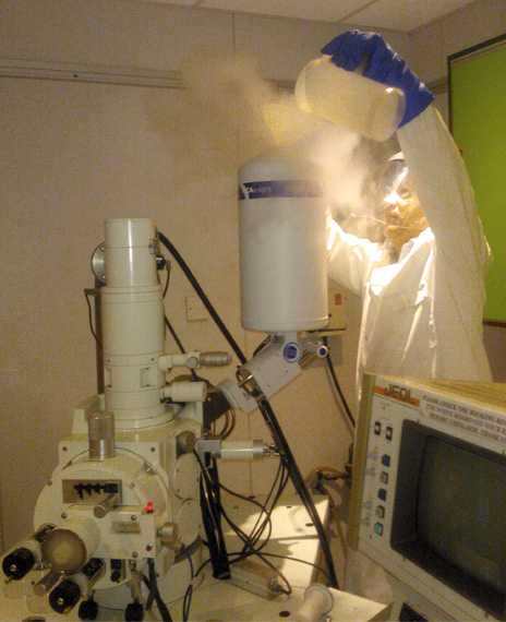 Liquid Nitrogen being fed into the electron-microscope. Photo; ArCHIAM; 2014.